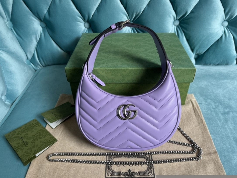 G*u*i top handle bags